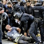 Louis Vuitton fashion show turns ugly: Protesters clash with police after Barcelona park was closed for catwalk event starring Sophie Turner, Jennifer Connelly and Ana de Armas