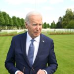 Biden visits cemetery Trump said was ‘filled with losers’ : NPR