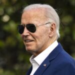 Biden assails Democratic elites as he fights to remain in the race