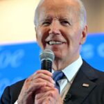 Biden tells campaign staffers he’s staying in the race : NPR