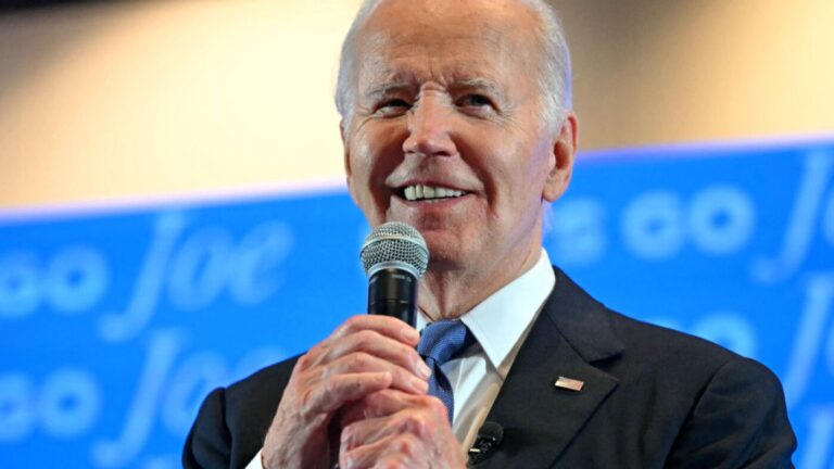 Biden tells campaign staffers he’s staying in the race : NPR